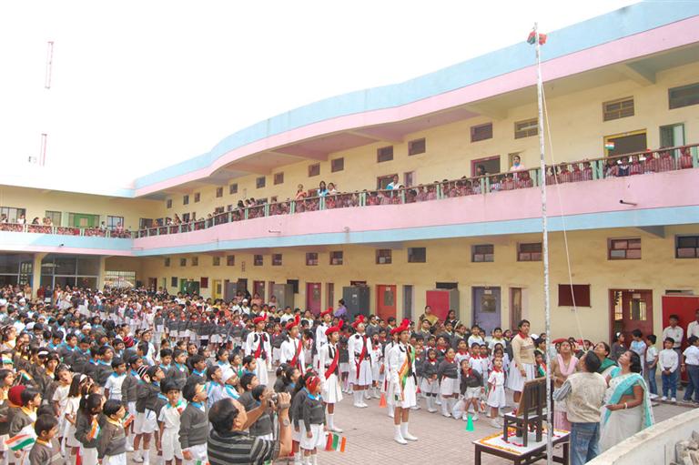 Flag hoisting with senior and junior school students